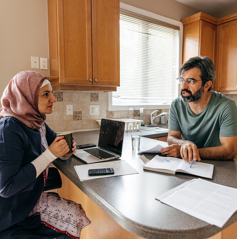 Couple in discussion at home